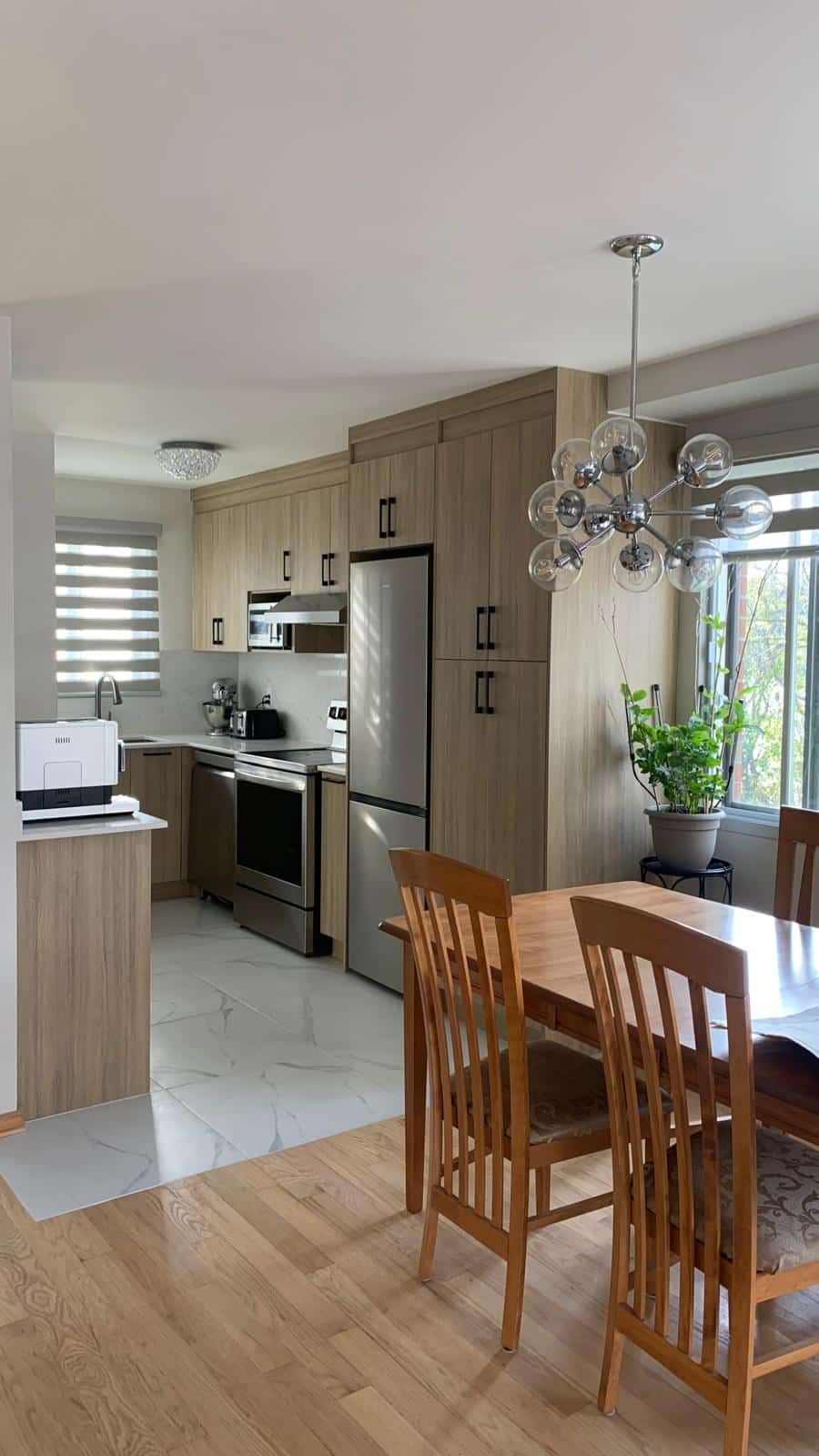 Finished custom kitchen with quartz countertop by Limakdéco in Montréal