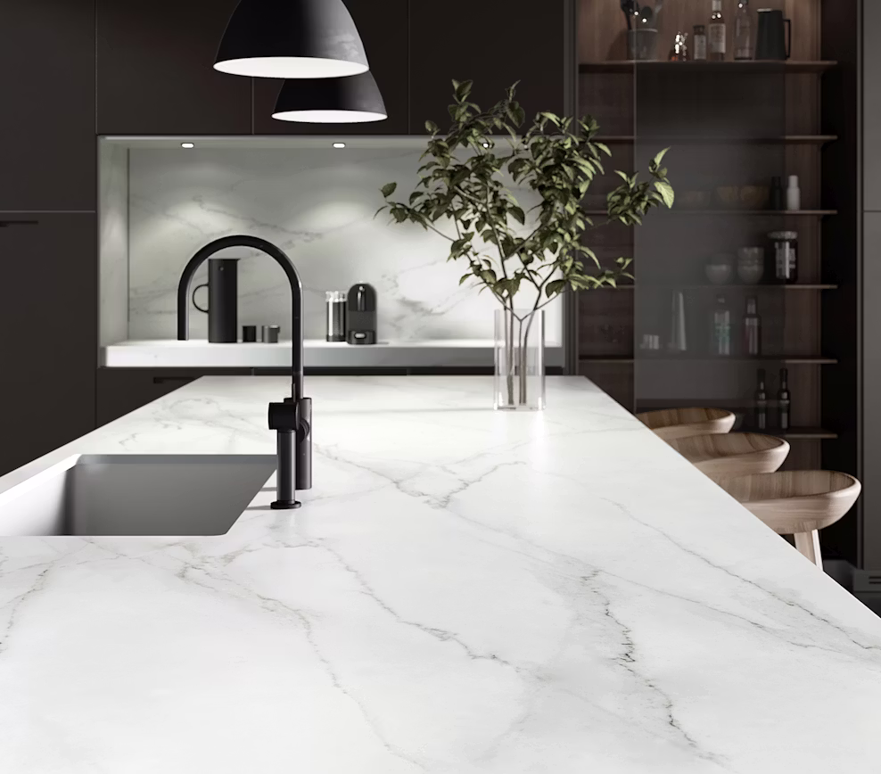 Dekton Rem countertop and backsplash in a contemporary Montréal kitchen with dark cabinetry and a black faucet